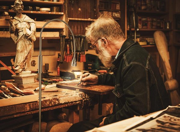 Wood carving hobby while using a daylight lamp